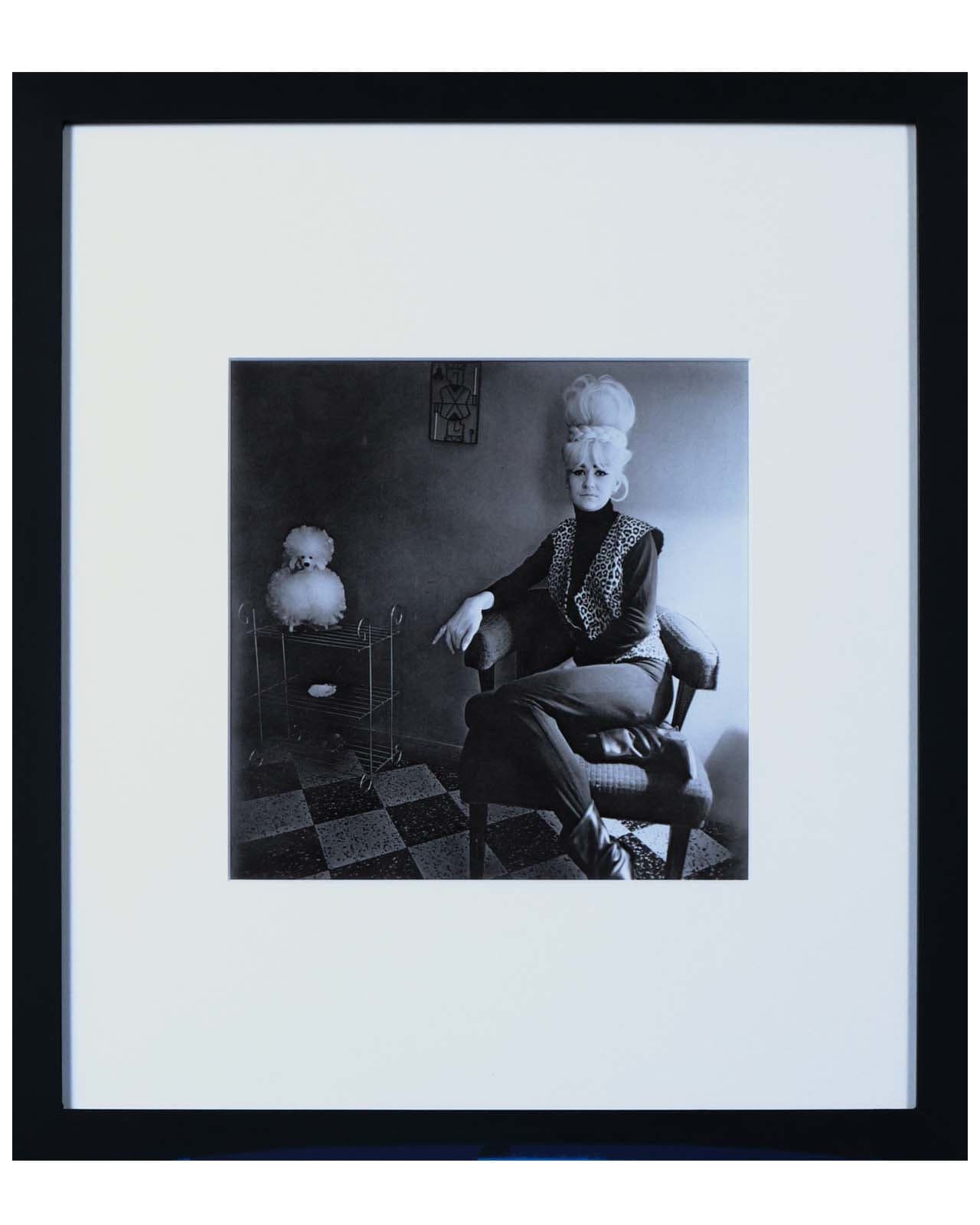 Lady Bartender at Home With a Souvenir
